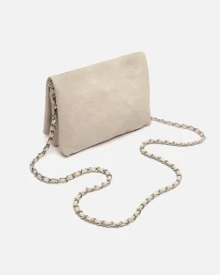 Bolso bandolera pequeño con solapa y grabado de estrellas