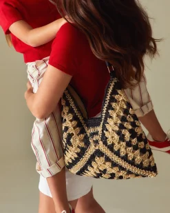 Bolso hobo efecto rafia con estampado