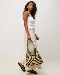 Bolso hobo efecto rafia con estampado