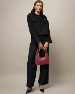 Bolso hobo pequeño con detalles metálicos