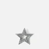 Broche en forma de estrella con detalles brillantes