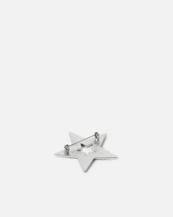 Broche en forma de estrella con detalles brillantes
