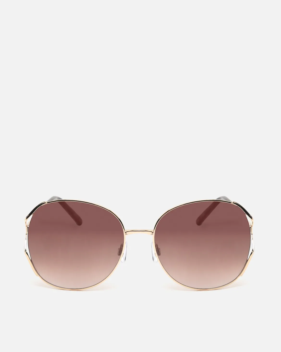 Gafas de sol redondas con montura metálica