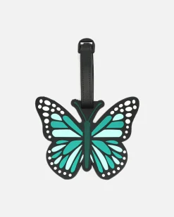Identificador de equipaje en forma de mariposa