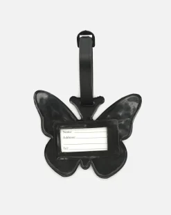 Identificador de equipaje en forma de mariposa