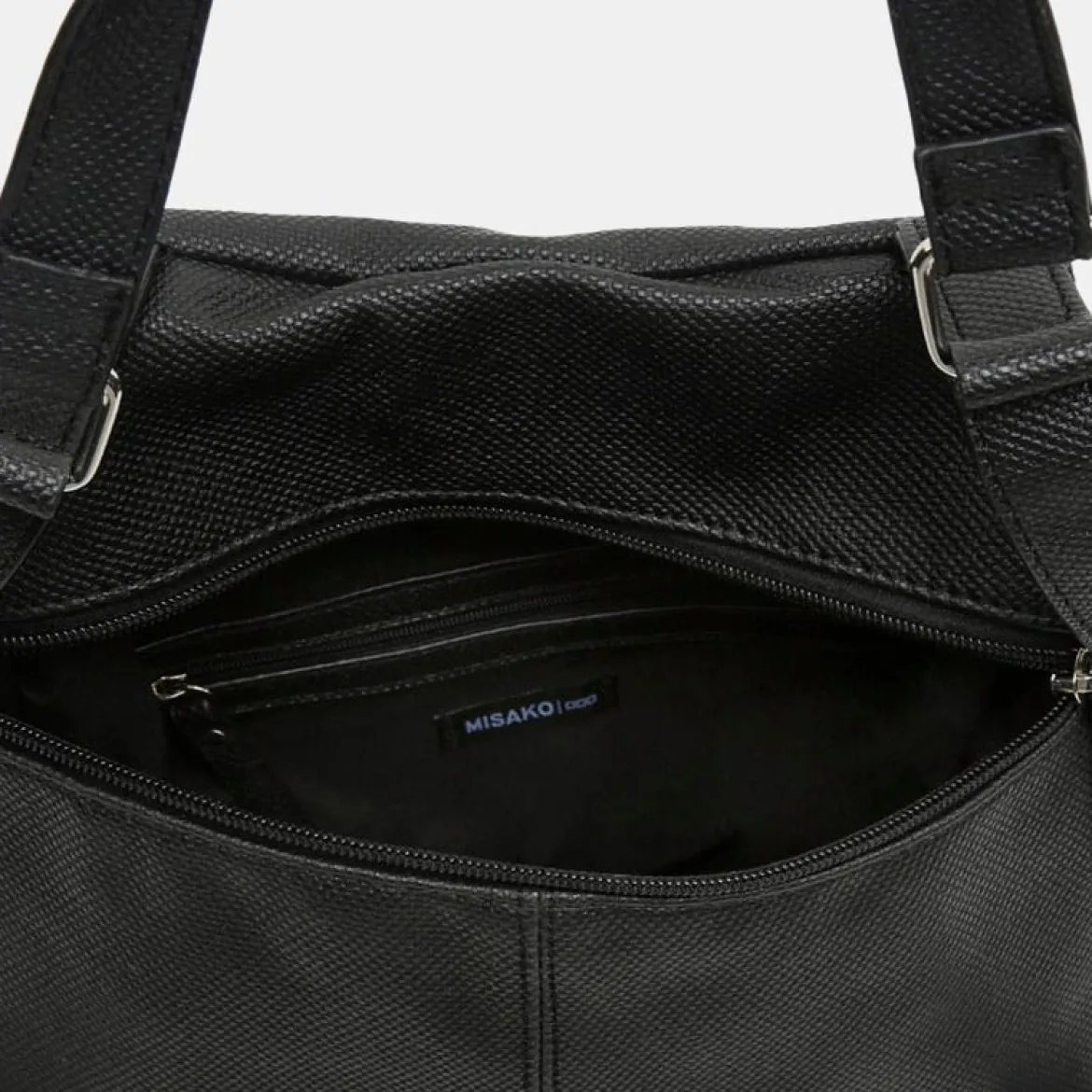 Mochila antirrobo con detalles metálicos